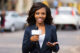 african female news reporter in live broadcasting